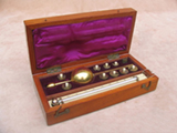 19th century Sikes hydrometer set by BUSS of Hatton Garden with book of tables